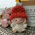 Red hatwhite clothes