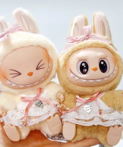 Labubu Dolls, The First And Second Generations Of Vinyl Macarons, Are Dressed Up In Party Clothes To Change Into Baby Dresses