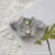 Grey wooden button